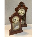 Two early 20th Century American walnut cased mantel clocks, both with gilt detail to glazed doors,