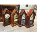 Four American arch top mantel clocks with painted glass doors, one with Gothic design, approx.