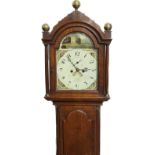 A Georgian country oak long case clock with painted arch dial, scene of country house, face