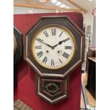 An American Ansonia octagonal cased wall clock together with a Roman numerated dial clock, both a/f,