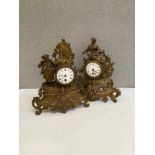 Two late 19th Century ormolu mantel clocks of figural form, with pendulums
