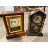 Two early 20th Century American mantel clocks, both with images to glass fronts