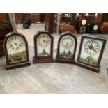 Four American mantel clocks with painted pictorial glass doors