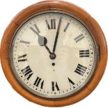 A circa 1900 oak cased dial clock with single fusee mechanism, Roman numerated painted face, case