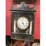 A late 19th Century ebonised hanging wall clock with painted foliate detail, Roman enamel dial, with