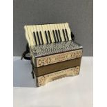 A Hohner Student II 12 bass piano accordion