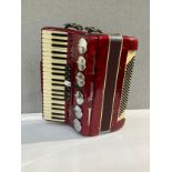 A Parrot 120 bass piano accordion, red pearlescent case, cased