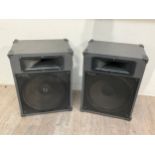 A pair of TOA PA speakers with stands