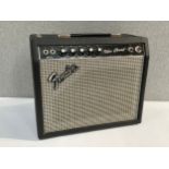 A vintage Fender Vibro Champ electric guitar amplifier circa 1981, serial number with Weber