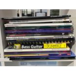 A collection of bass guitar tuition and reference books including Haynes Fender Bass Manual