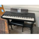 A Yamaha Clavinova CVP-6 keyboard with stand, footstool and cover