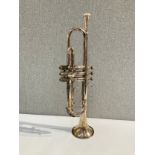 An early-mid 20th Century Buescher, Elkhart silver plated trumpet, engraved design, cased