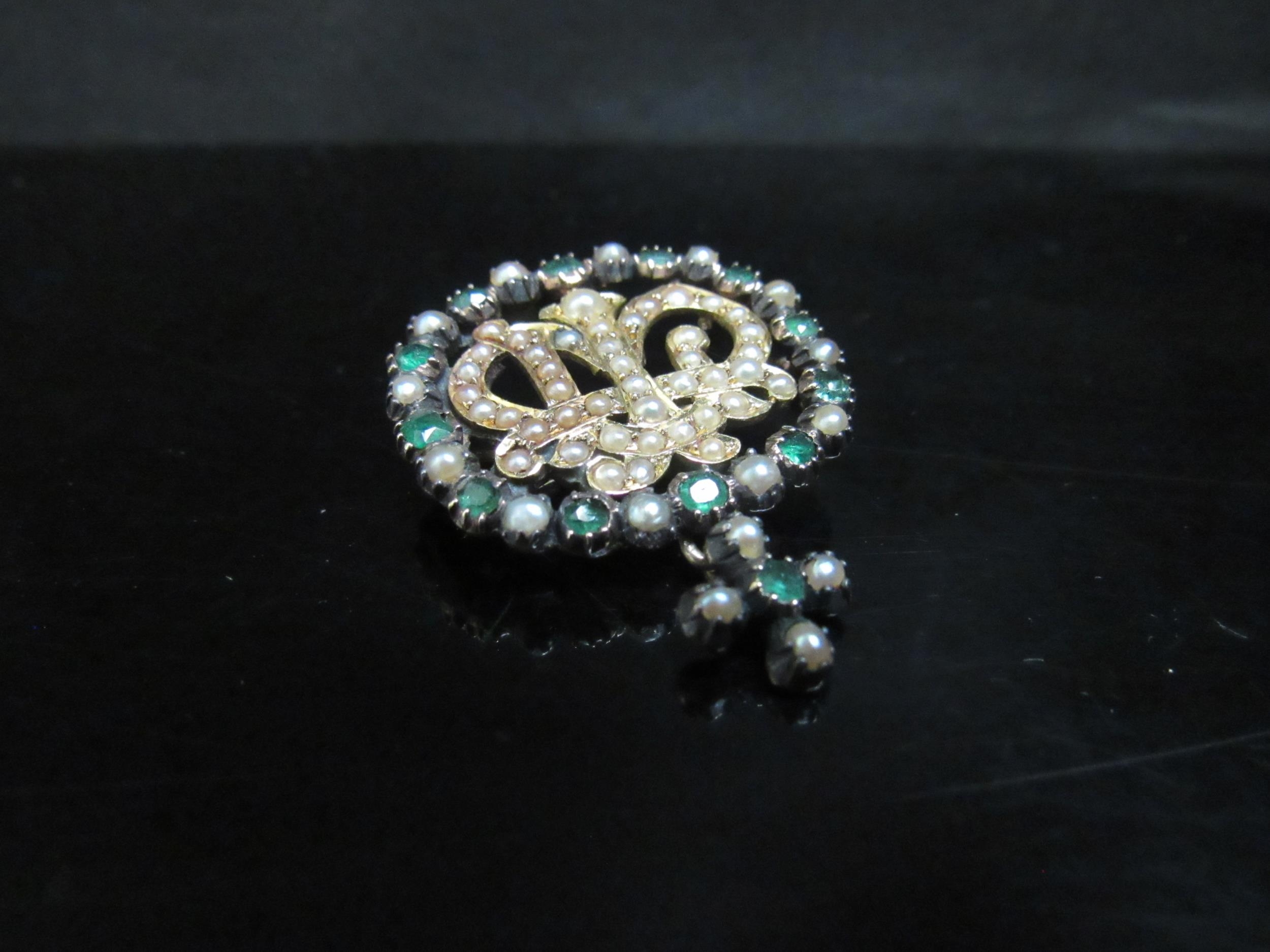 An emerald, seed pearl set brooch converted from a buckle, crown monogram to centre, unmarked, 7.3g - Image 3 of 4