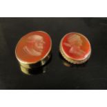 Two Victorian cornelian brooches with carved intaglios of gentleman, framed unmarked, 20.5g