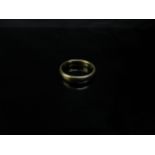 A 22ct gold wedding band. Size L, 5.3g