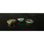 Three turquoise set rings including 18ct gold example, 5.4g