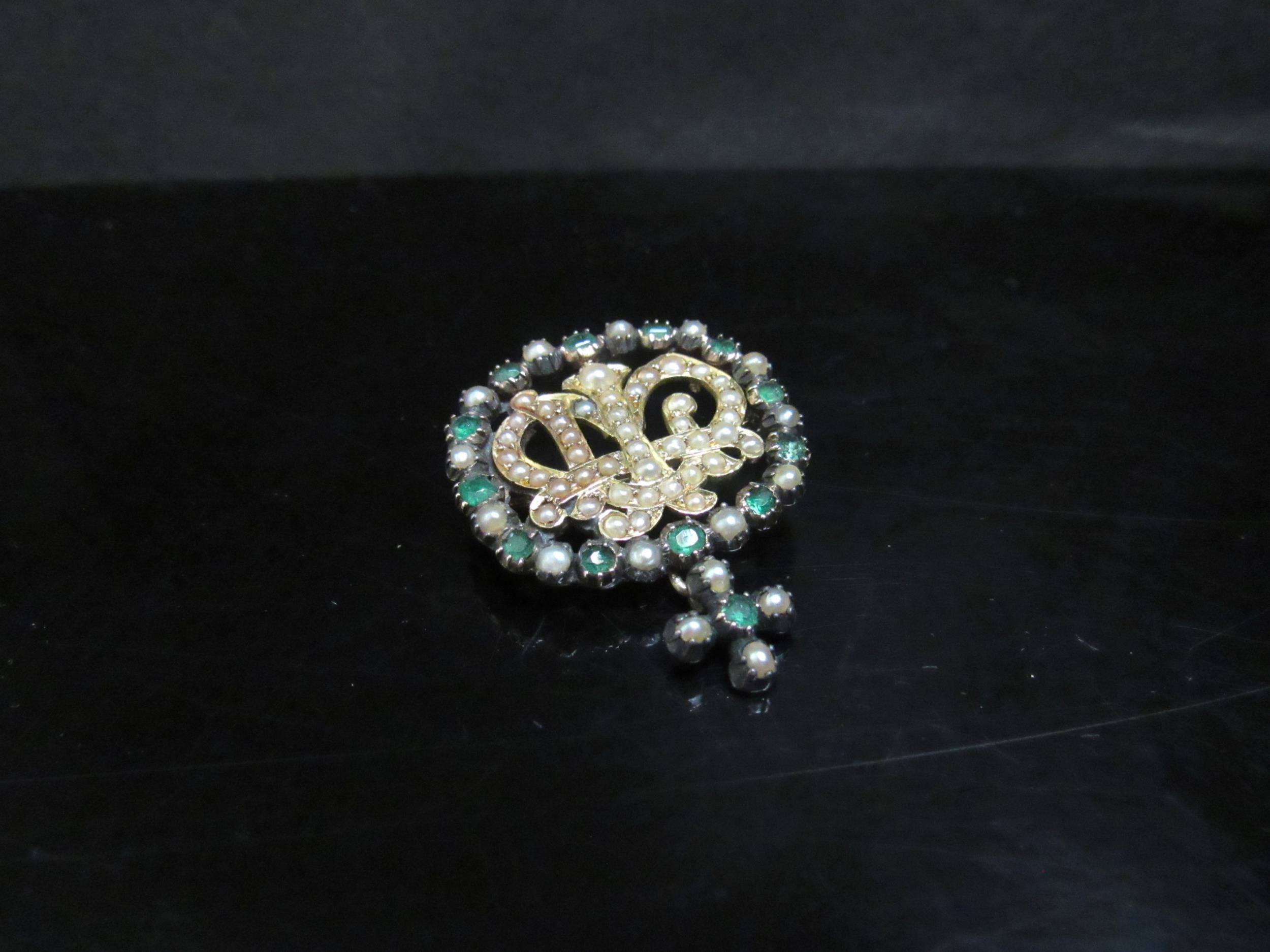 An emerald, seed pearl set brooch converted from a buckle, crown monogram to centre, unmarked, 7.3g - Image 2 of 4