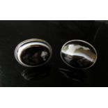 Two large banded agate rings including silver marked example. Sizes N and J, 32g