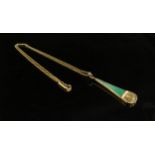 A gold pendant with tapering jadeite panel and Oriental character marks stamped 18, cm drop hung