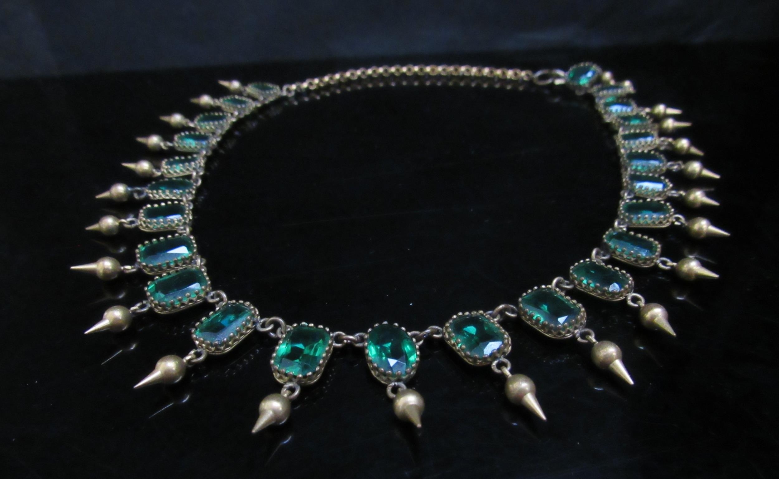 A riviere necklace set with emerald green paste stones each hung with pointed drop, gilt metal, - Image 3 of 4