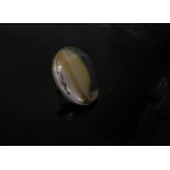 A large silver oval banded agate ring, 4cm x 3cm. Size M, 19.4g