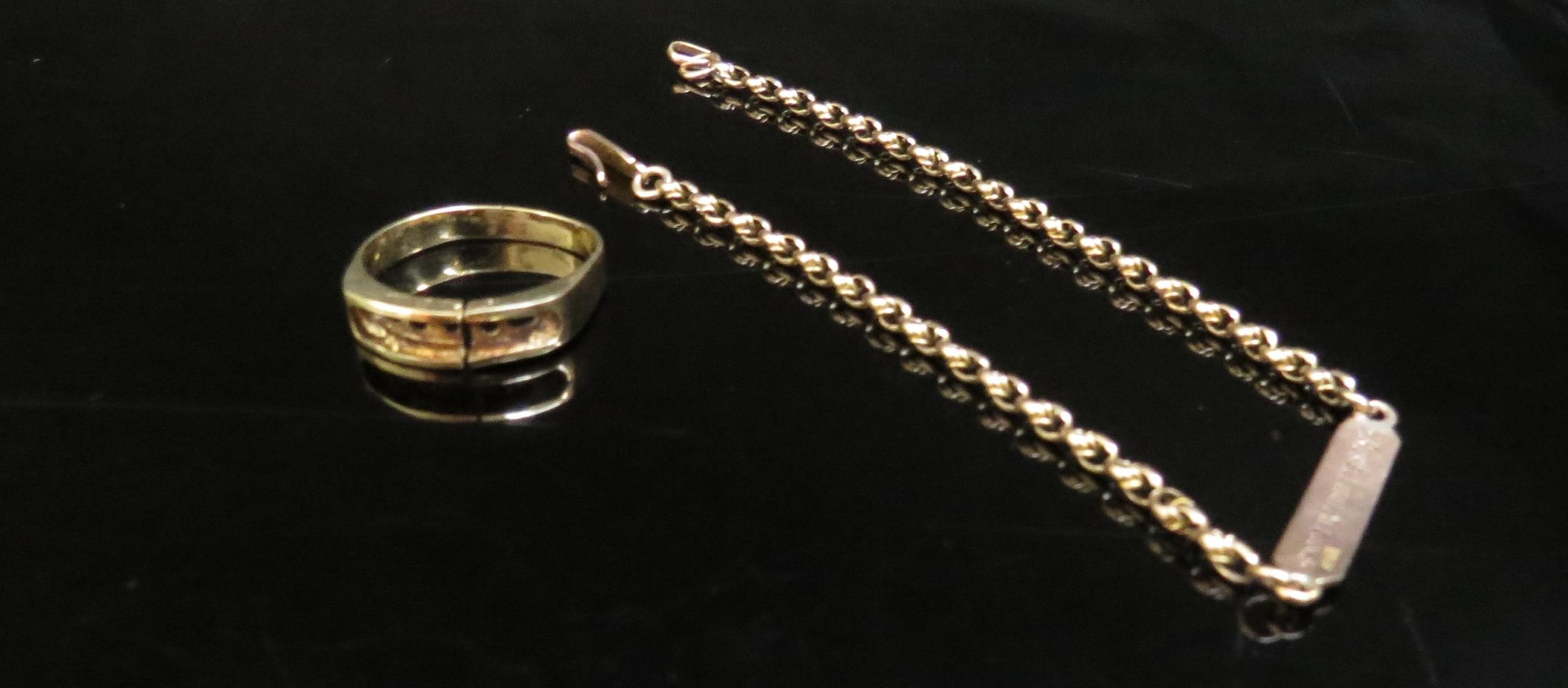 A 9ct gold identity bracelet, 3.5g and a gold ring, stones missing and cut, stamped 18k, 3.5g