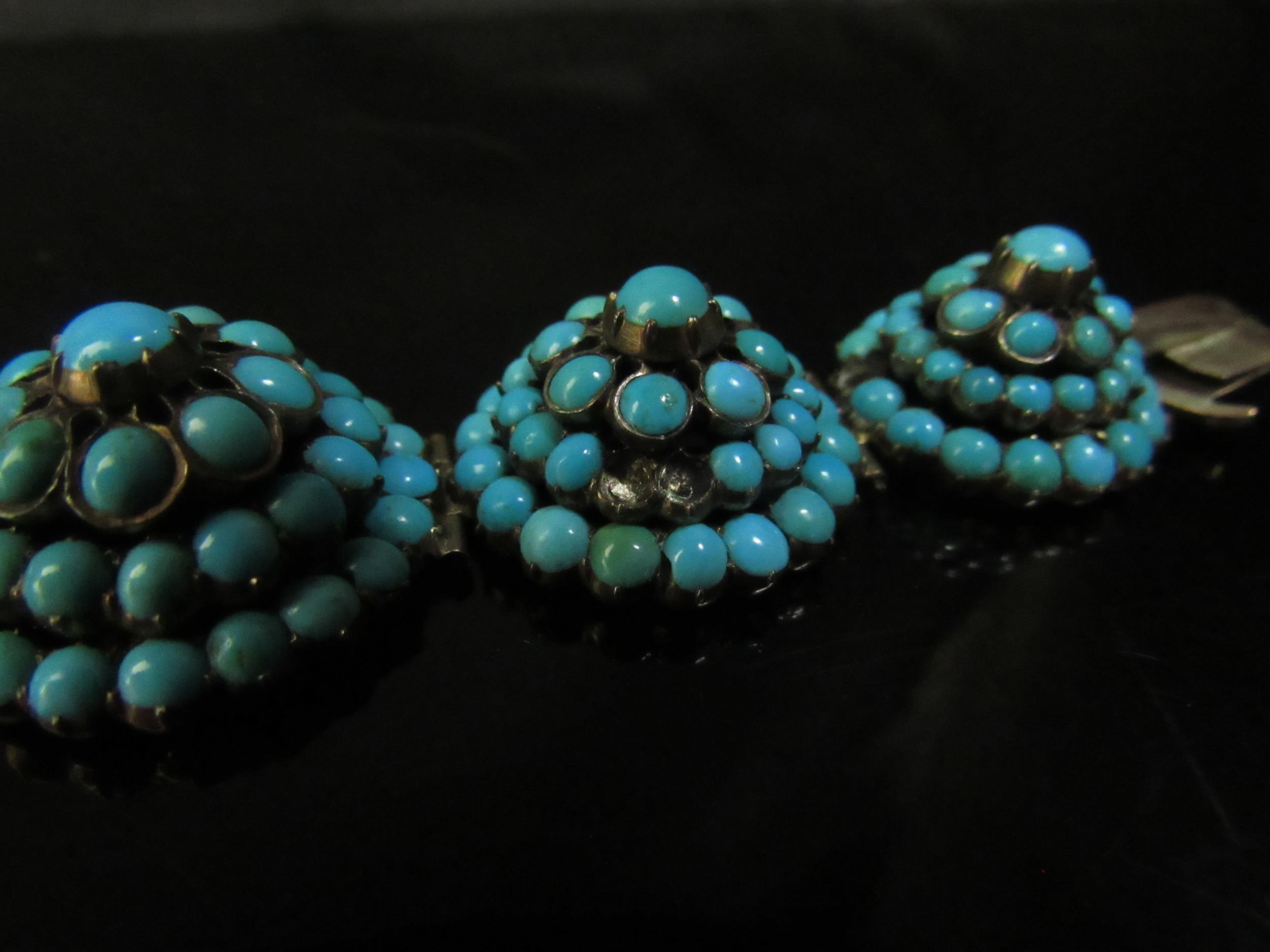 An eight panel turquoise cluster dome top bracelet, some stones missing, 18cm long - Image 4 of 4