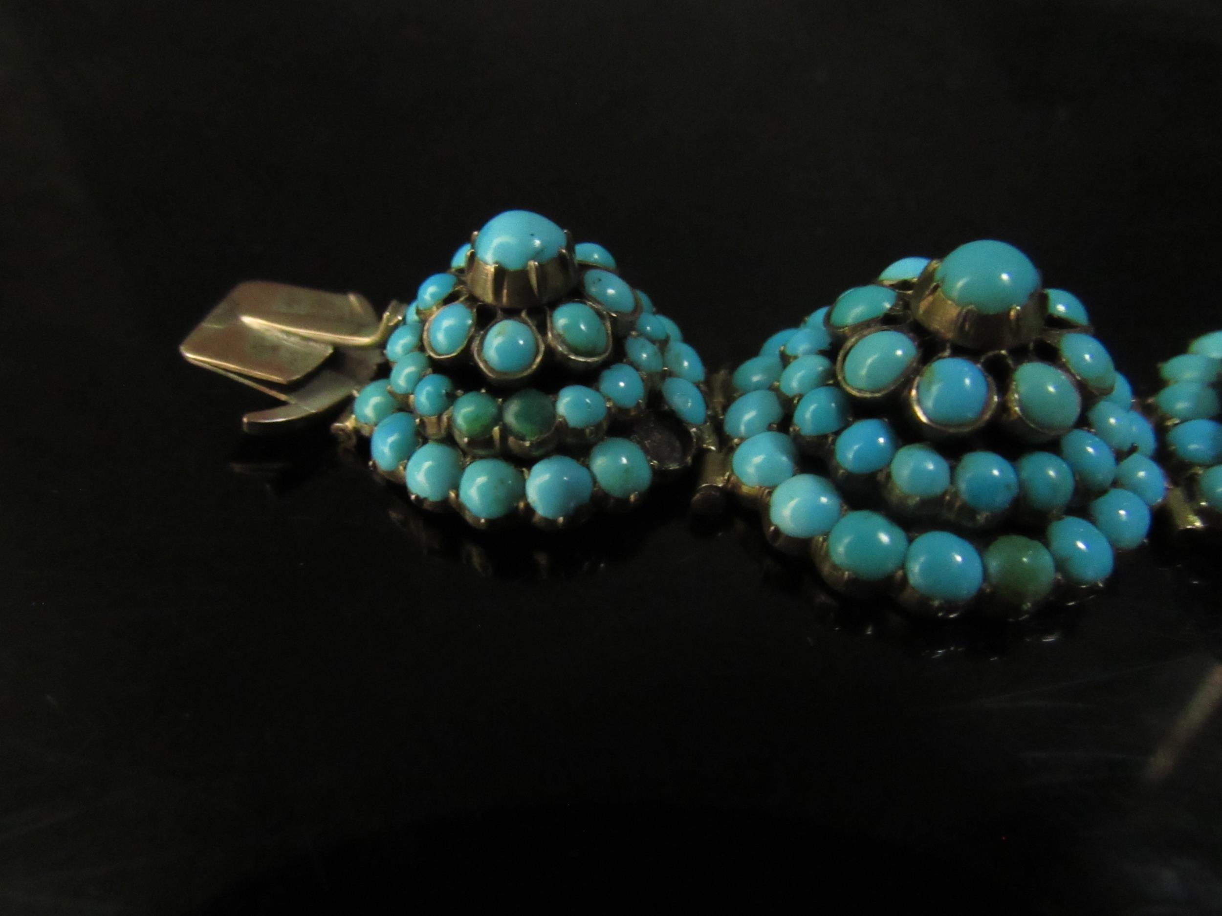 An eight panel turquoise cluster dome top bracelet, some stones missing, 18cm long - Image 3 of 4