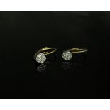 A pair of gold earrings with a diamond cluster, stamped 9kt, 1g