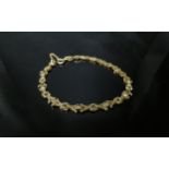 A 9ct gold fancy link bracelet, 17cm long, 4.1g
