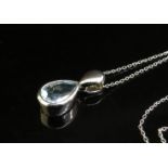 A 9ct white gold chain hung with a pale blue stone pendant, 2.9g total
