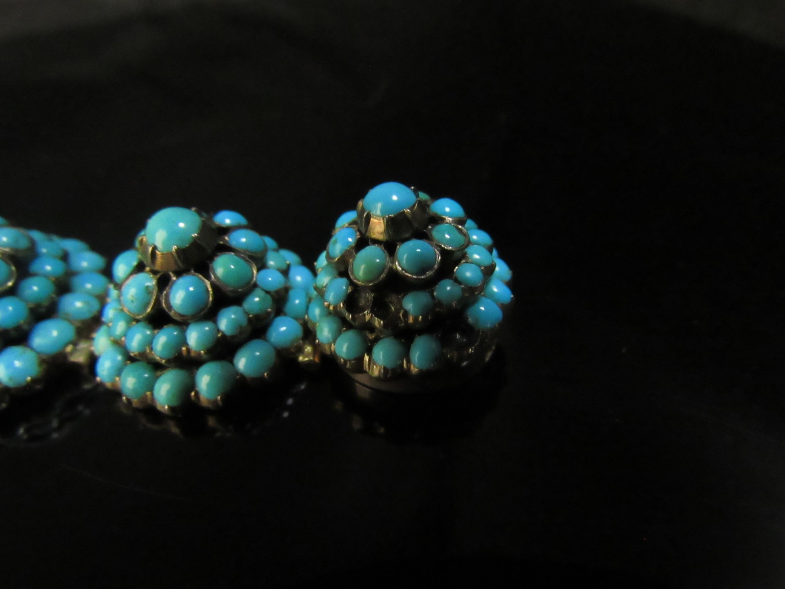 An eight panel turquoise cluster dome top bracelet, some stones missing, 18cm long - Image 2 of 4