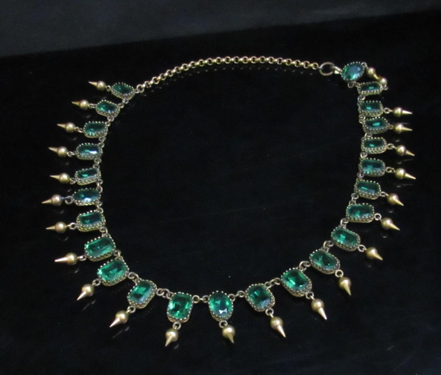 A riviere necklace set with emerald green paste stones each hung with pointed drop, gilt metal, - Image 4 of 4
