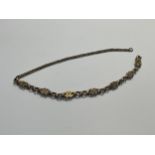 A gold watch chain, unmarked, 13.5g
