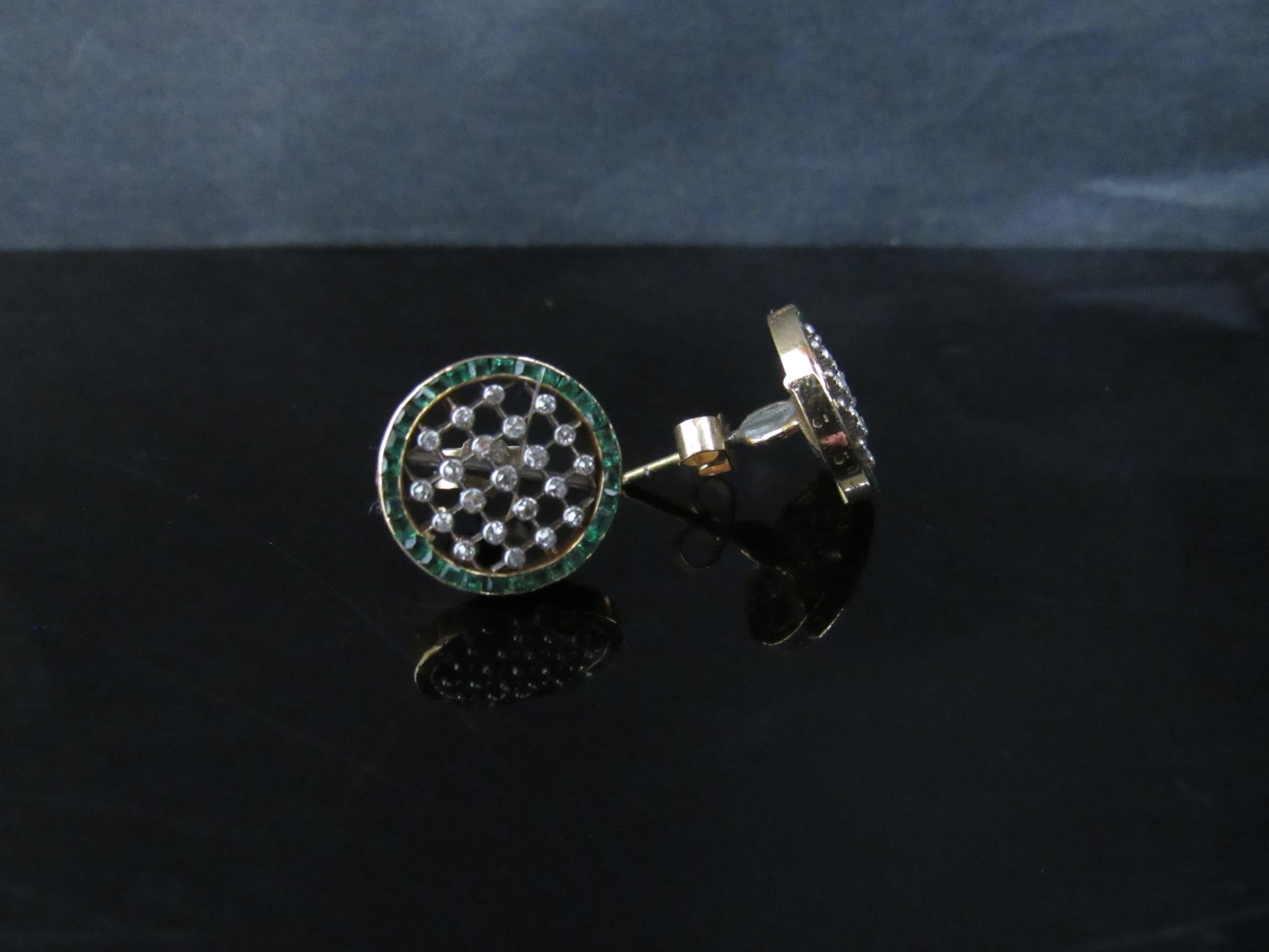 A 9ct gold ring with a circular crosshatch design studded with small diamonds framed by square cut - Image 3 of 3