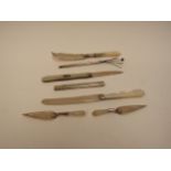 Mother of Pearl handled butter knife, penknife, book marks, pencil and twizzle stick (7)