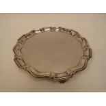 A Barker Brothers Silver Ltd waiter with pie crust edge. Birmingham 1936, 21cm diameter, 362g