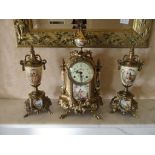 A Franz Herman Germany, two jewel brass clock garniture with ceramic panels