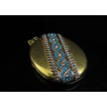 A Victorian turquoise and seed pearl set oval gold locket, monogrammed to verso, 4.5cm x 3.5cm,