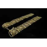 An unmarked gold filigree panel bracelet a/f, 17.5g