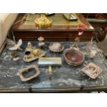 Various silver-plated items including wine coaster, single trumpet eperne, shell form butter dish