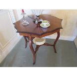 A Victorian rosewood shaped top occasional table, 71cm tall x 83cm diameter