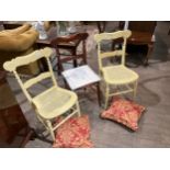 A pair of cream painted Edwardian cane seated bedroom chairs (cane a/f) and another (3)