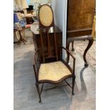 An early 20th Century Art Nouveau slender carver chair with impressed numbers to frame with matching