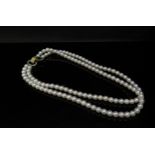 A double stranded pearl necklace 19cm long, diamond encrusted clasp, 42cm long
