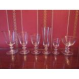 A suite of early to mid 20th Century Murano blade knop glasses with etched swag border, 12 large, 12