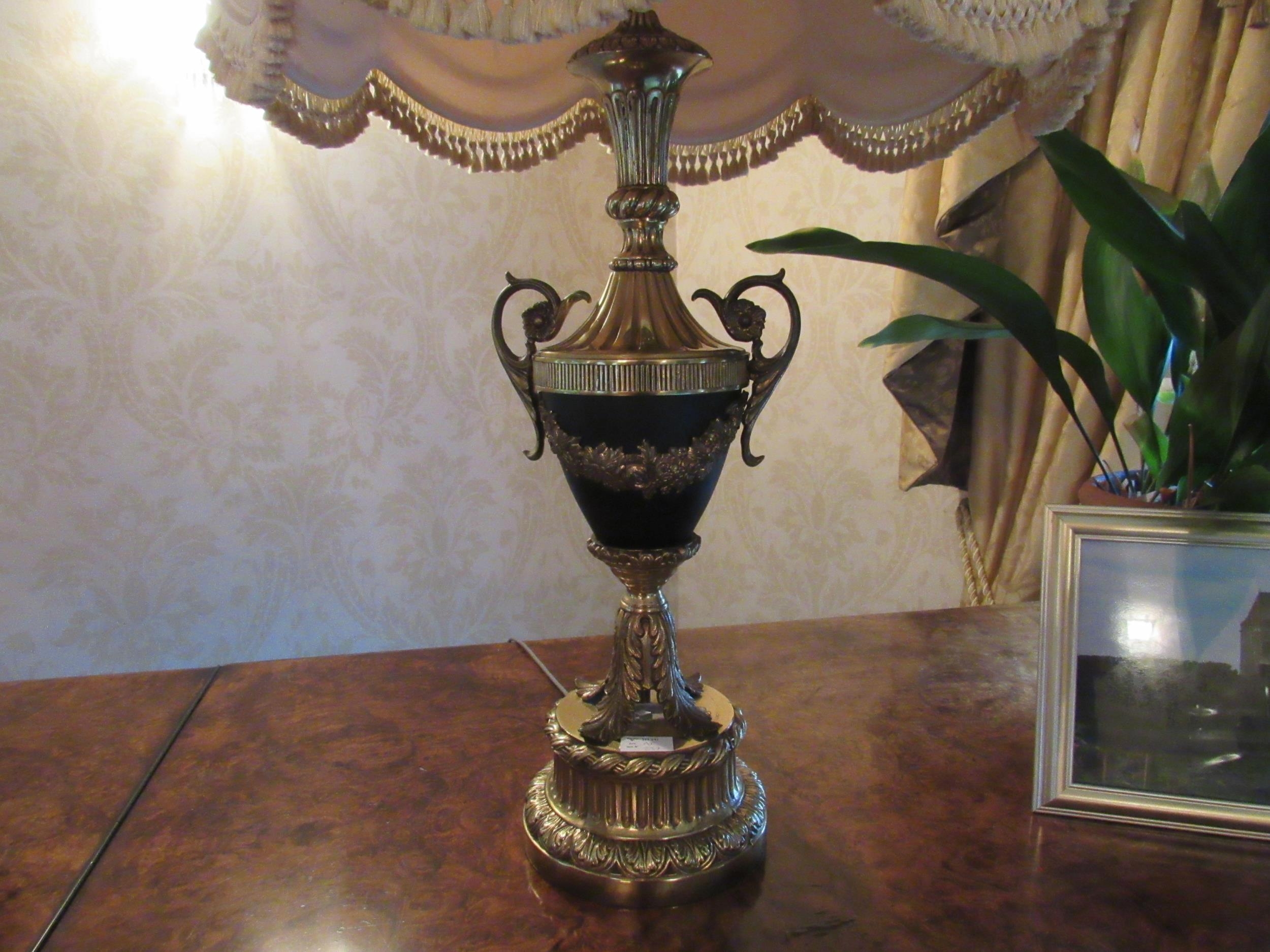 A Classical French style table lamp of urn form with swag and leaf detail, tasselled shade, - Image 2 of 2