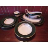 A large Spode Green Velvet dinner service for 13 people and associated Royal Doulton Carlyle