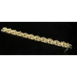 A 18ct gold bark effect bracelet, 19cm long, 61.8g