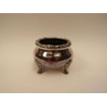 A Sterling silver sugar bowl raised on four feet, 8cm tall, 11cm diameter, 220g